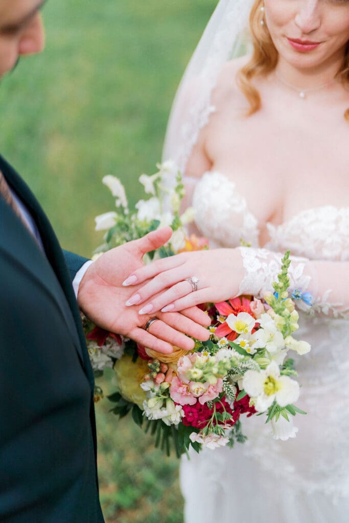 Romantic wedding portrait in Tennessee vineyard with rolling hills background.