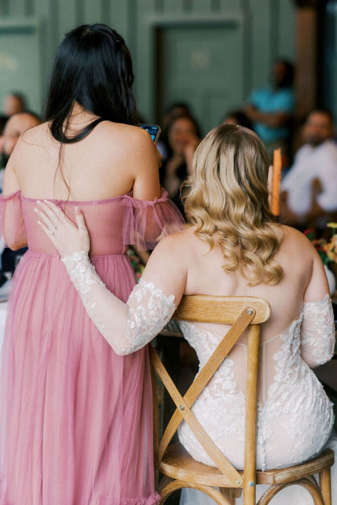 maid of honor speaks during ceremony at harpers vineyard venue in tennessee