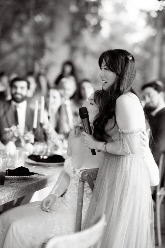 maid of honor speaks during ceremony at harpers vineyard venue in tennessee