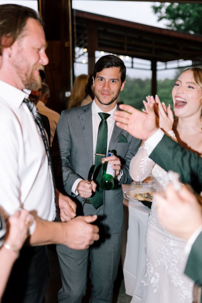 Guests dancing during wedding reception at Harper’s Vineyard in May.