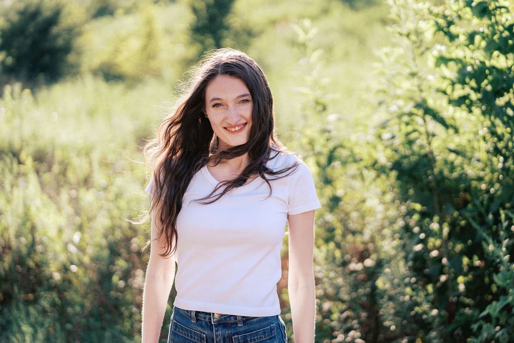 woman poses at seven islands state birding park in knoxville tennessee