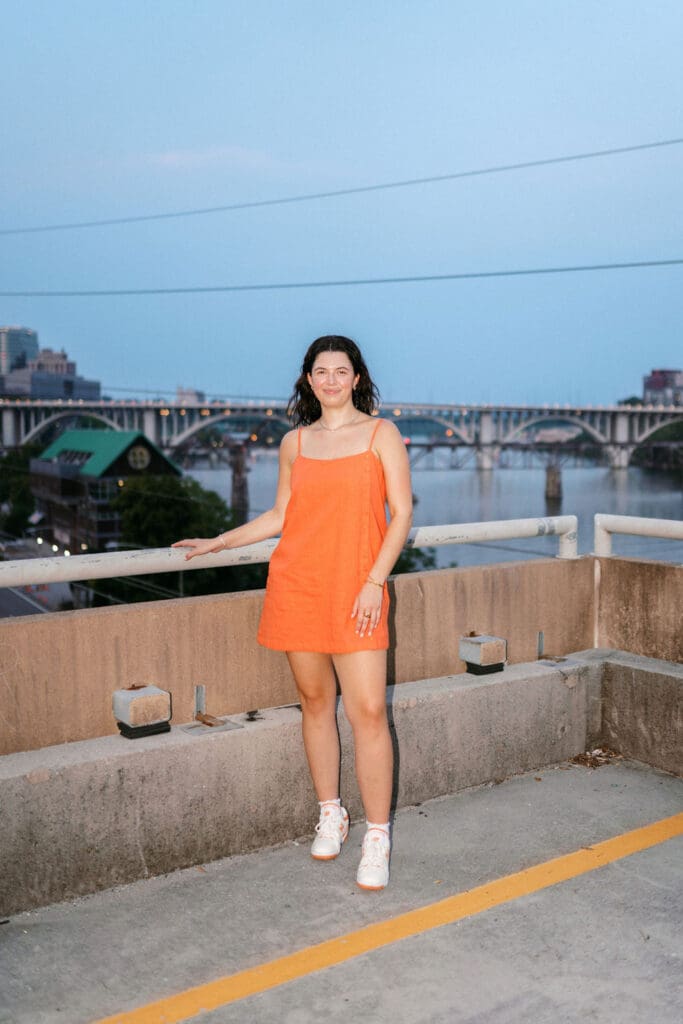 girl in orange dress during sunset at neyland stadium on the university of tennessee knoxville campus