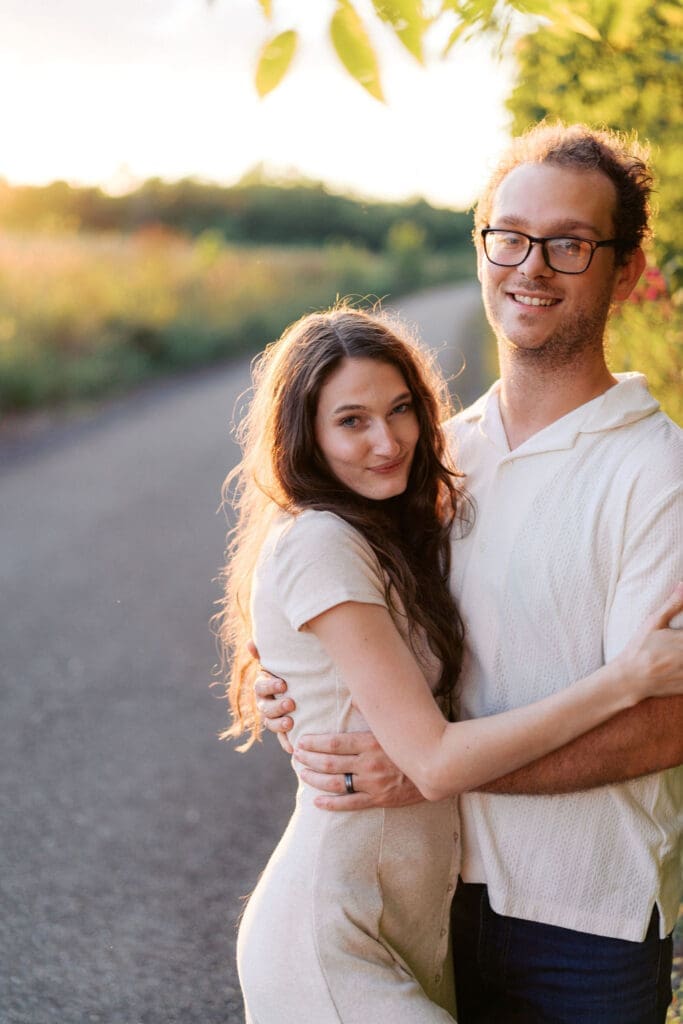Knoxville couple posing for engagement portraits at Seven Islands State Birding Park