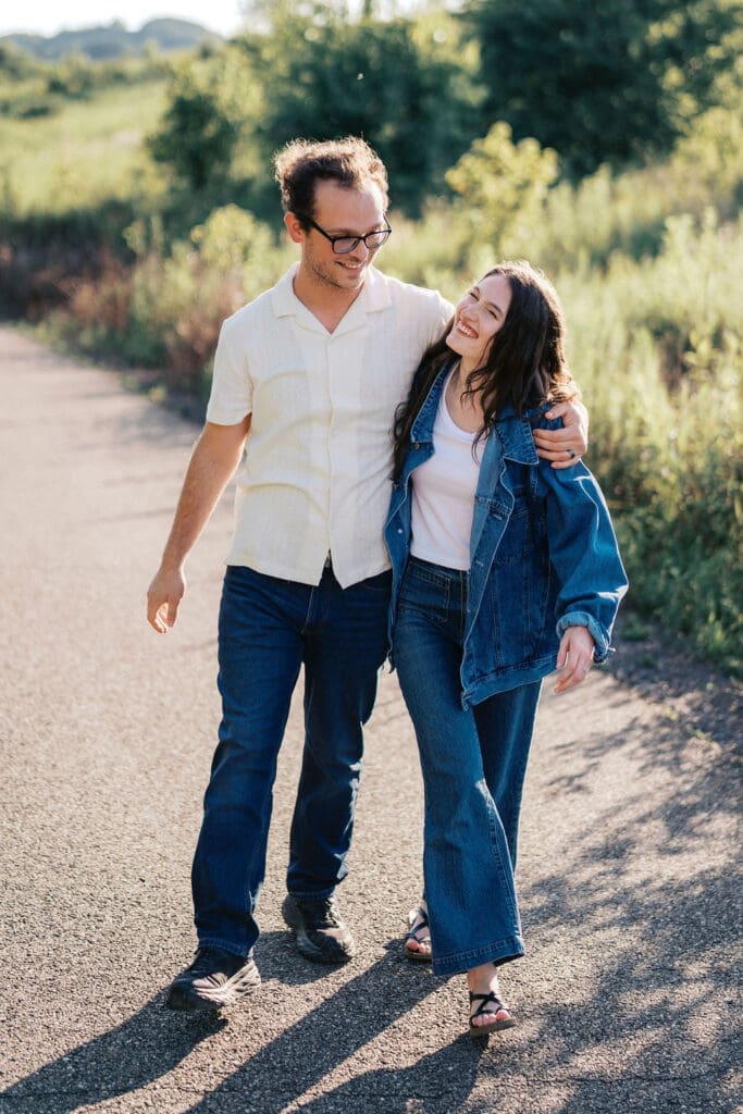 Knoxville couple posing for engagement portraits at Seven Islands State Birding Park